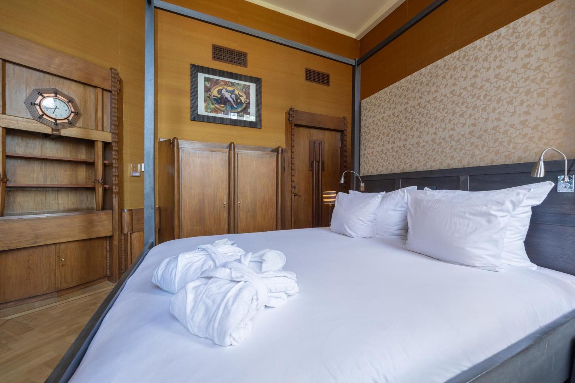 فندق جراند أمراث أمستردام المظهر الخارجي الصورة A bedroom at the hotel