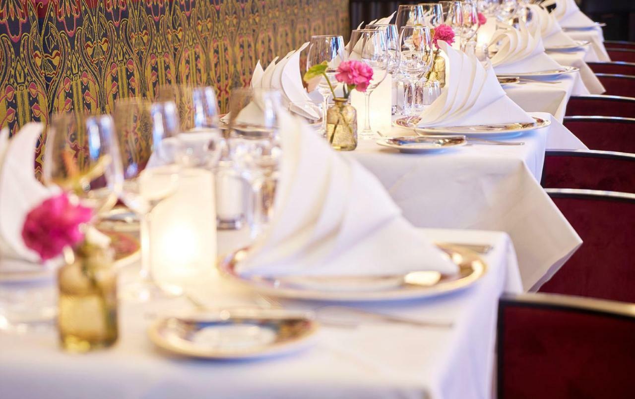 فندق جراند أمراث أمستردام المظهر الخارجي الصورة A table set for fine dining